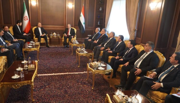 رئيس الحكومة السورية ووزير الخارجية الإيرانية