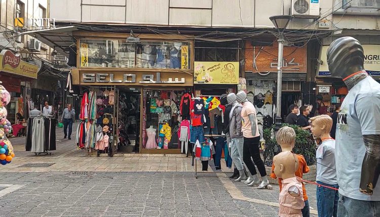 سوق لبيع الألبسة في دمشق - نورث برس