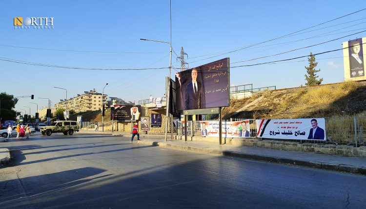 لافتات في حلب لمرشحين لانتخابات مجلس الشعب - نورث برس