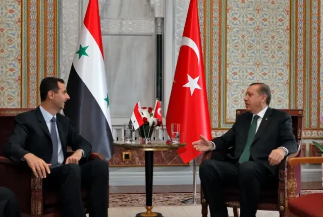 لقاء سابق بين الرئيس السوري بشار الأسد ونظيره رجب طيب أردوغان - أ ف ب