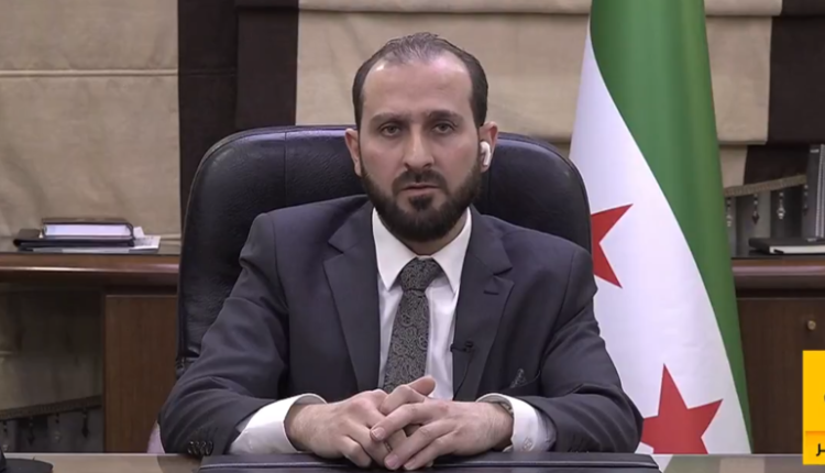 وزير الإعلام بالحكومة السورية المؤقتة محمد العمر