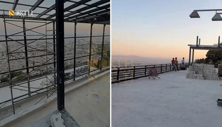 جانب من أعمال البناء الجارية على سفح جبل قاسيون بدمشق - نورث برس
