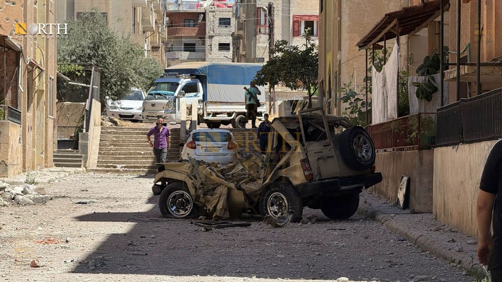 آثار الاشتباكات في أحياء مدينة السويداء بعد انسحاب الجيش السوري - نورث برس