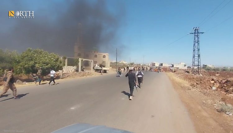 عناصر للجيش والعشائر على مدخل مدينة السويداء خلال الاشتباكات التي شهدتها الأسبوع الماضي - نورث برس