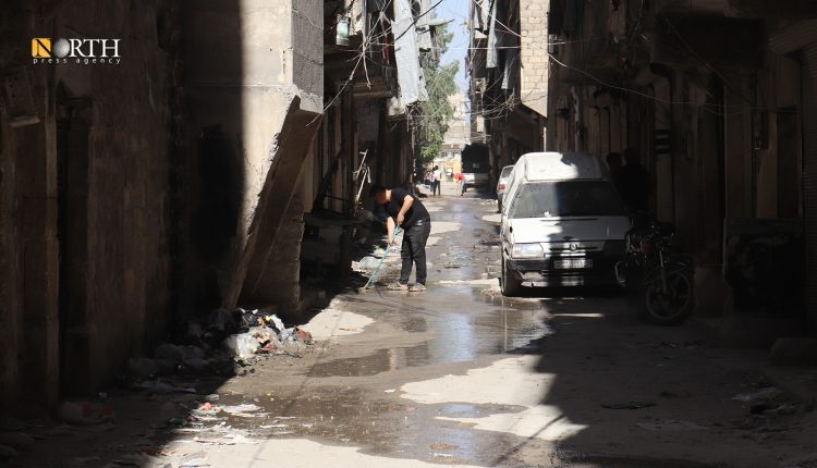 تسرب مياه الصرف الصحي إلى شارع سكني بحي الفردوس في حلب - نورث برس