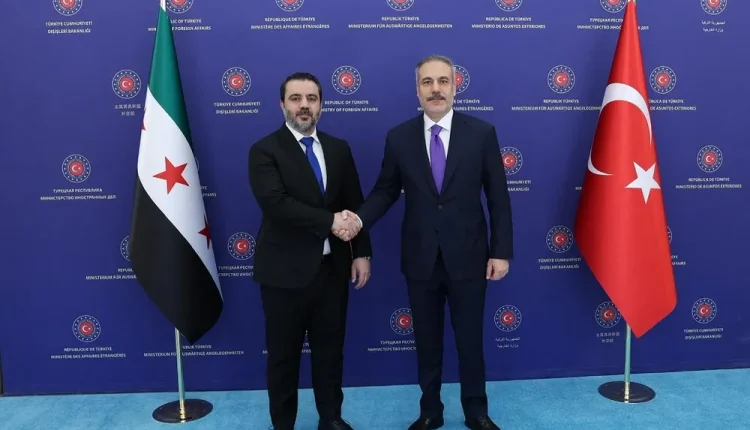 لقاء سابق جمع وزير الخارجية التركي هكان فيدان و السوري أسعد الشيباني