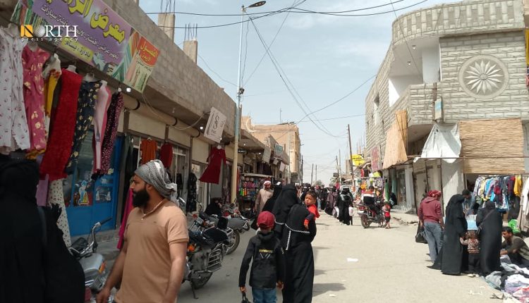 أحد محال الصرافة في دير الزور - نورث برس