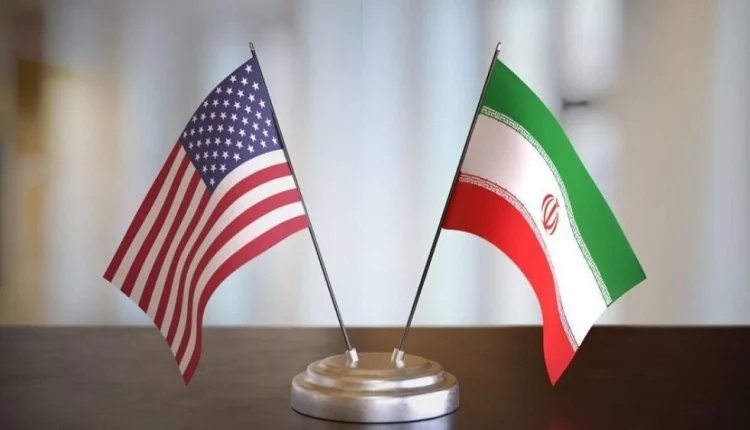 العلم الأميركي والإيراني