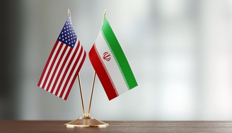 العلم الأميركي والإيراني