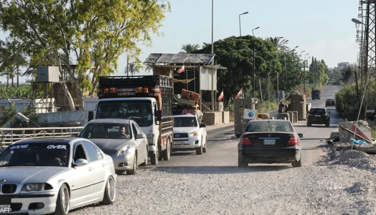 نازحون لبنانيون بدأوا العودة إلى ديارهم بعد وقف إطلاق النار- أ ف ب